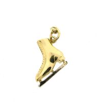 Two-tone gold pendant of a skate