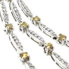 Image 6 of White gold stud earrings with yellow sapphire and diamond; 0.56 ct.