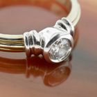 Image 2 of 18-karat bicolor solitaire ring with 0.20 ct. diamond