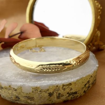 Image 2 of Gold slave bracelet with engravings; Size M