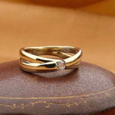 Image 2 of Gold crossover ring with diamond; 0.12 ct.