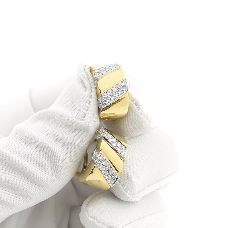 Image 13 of Gold stud earrings set with diamonds; 0.70 ct.