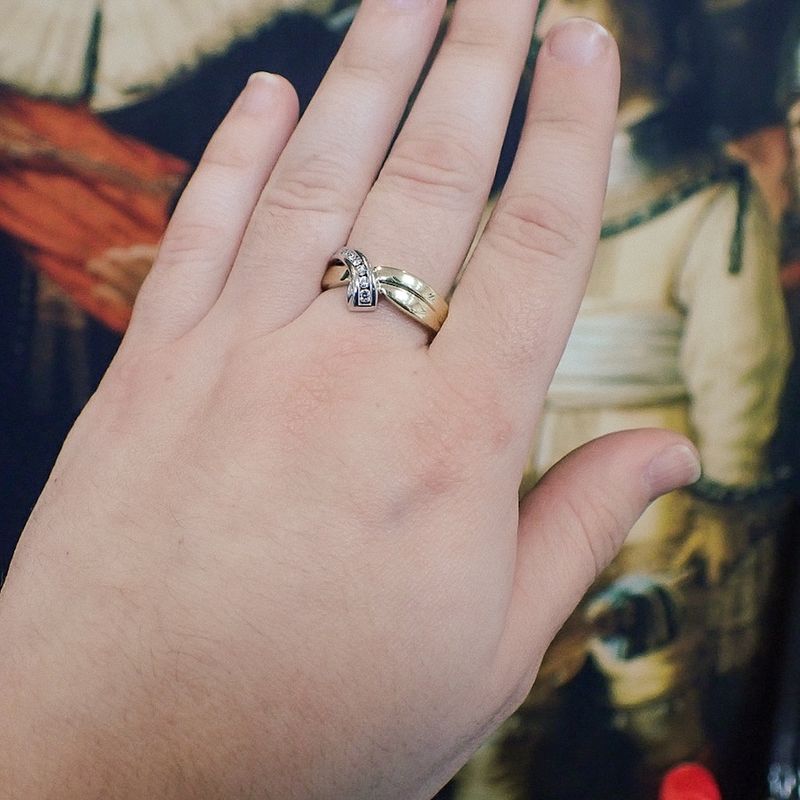 Image 4 of Two-tone gold subtle ring with 0.11 ct. diamond