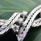 Image 6 of White gold herringbone link necklace with diamond; 0.63 ct.