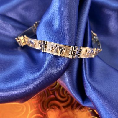 Image 2 of Two-tone gold link bracelet with elephants