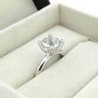 White gold 'Phlox' ring set with aquamarine and diamonds; Bron Jewelry