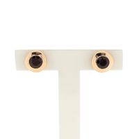 Rose gold stud earrings with garnet