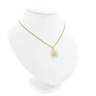 Image 4 of Two-tone gold pendant of the letter M with diamonds; 0.03 ct.