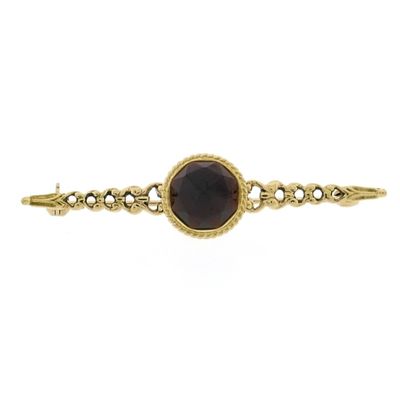 Image 1 of Antique gold brooch with garnet.