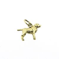 Gold pendant of a dog