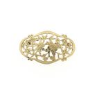 Image 1 of Vintage gold brooch with a floral design