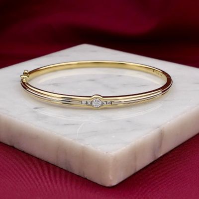 Afbeelding 2 van Bicolor gouden slavenarmband met diamanten; Maat M/L