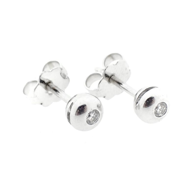 Image 1 of 18 carat white gold solitaire stud earrings with 0.07 ct. diamonds.