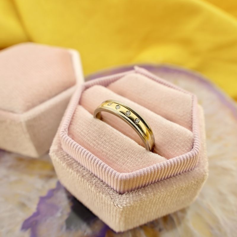 Image 2 of Two-tone gold ring with diamonds; 0.02 ct.