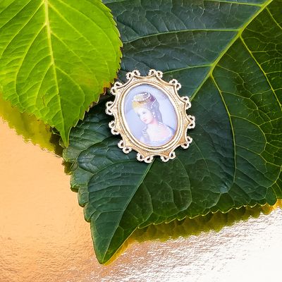Image 2 of Vintage gold pendant/brooch with painted portrait and diamond 0.010 ct.