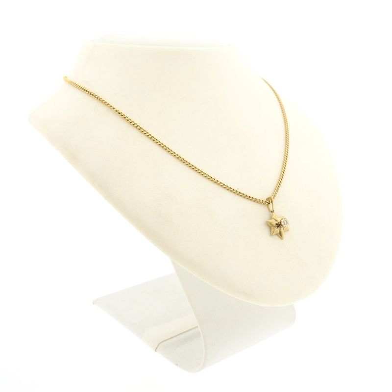 Image 4 of Gold subtle star pendant with diamond | 0.035 ct.
