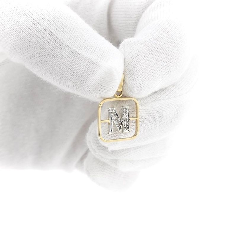 Image 9 of Two-tone gold pendant of the letter M with diamonds; 0.03 ct.