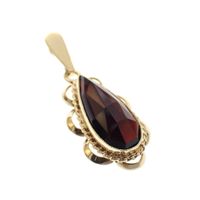 Vintage gold pendant with garnet stone