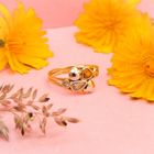 Image 7 of Gold ring with a mix of gemstones