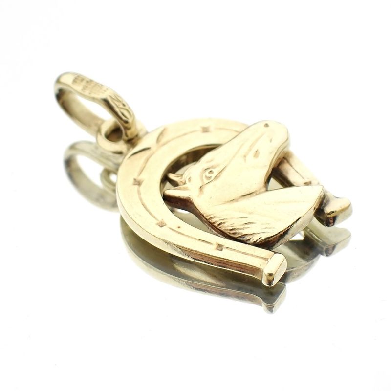 Image 3 of Gold pendant of a horse with a horseshoe