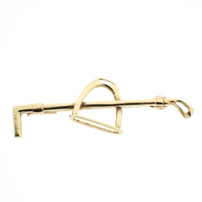 Image 1 of Golden polo sports brooch.