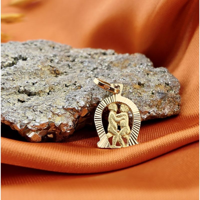 Image 2 of 18 kt gold pendant of the Gemini zodiac sign