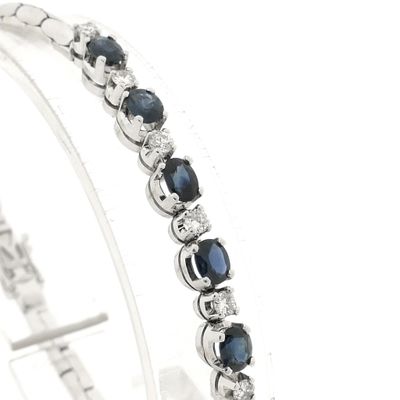 Image 2 of White gold cobra link bracelet with sapphire and diamond; 0.24 ct.