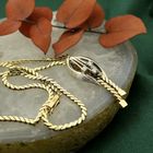 Image 2 of Two-tone gold necklace with fixed pendant and diamonds; 0.09 ct.