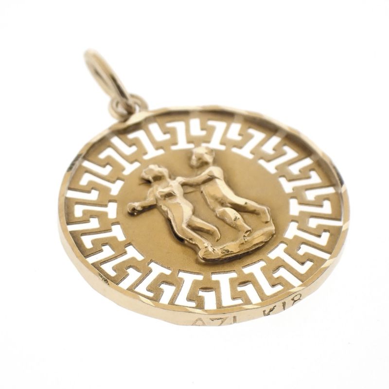 Image 4 of 18 kt gold pendant of the Gemini zodiac sign