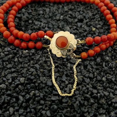 Image 2 of Antique red coral beaded bracelet with gold decorative clasp.