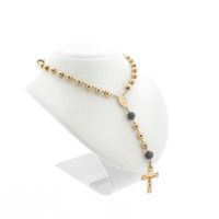 Gold rosary necklace with patinated beads
