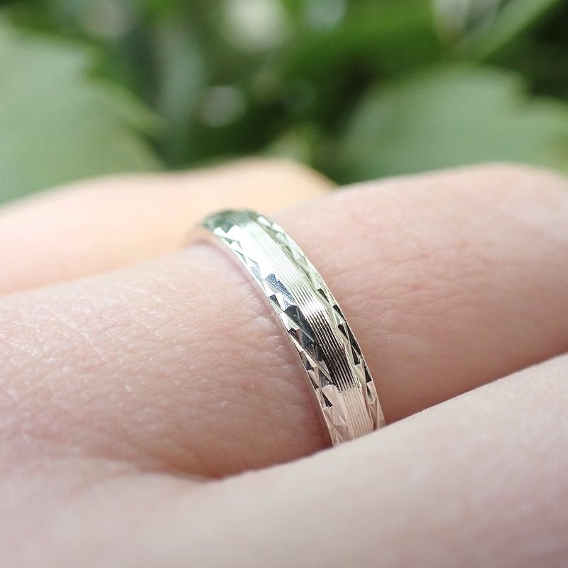 Image 2 of Silver ring with facets