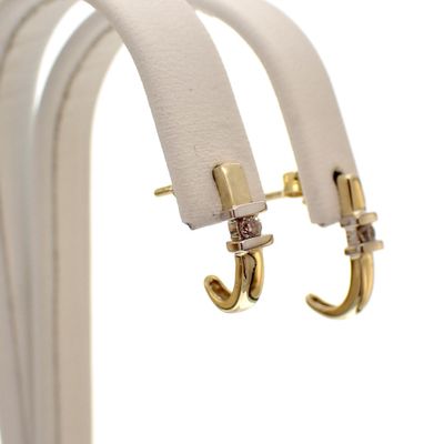 Image 1 of Bicolor gold stud earrings with zirconia