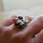 Image 6 of Silver ring with multiple colored Nazar eye charms