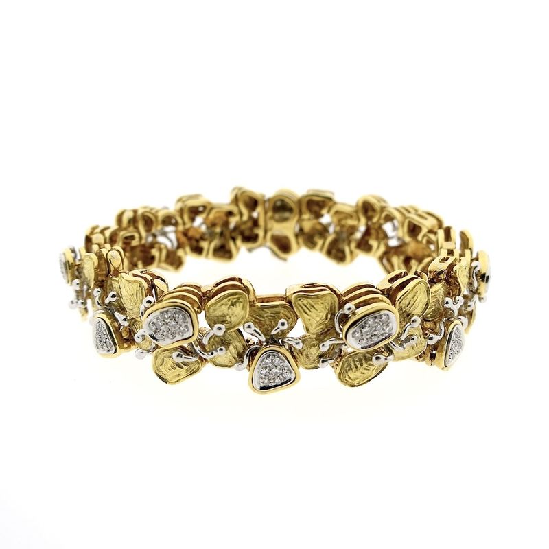 Image 4 of Two-tone gold fantasy bracelet with 0.525 ct diamond.