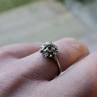 Image 11 of Antique white gold entourage ring with 0.10 ct diamond.