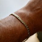 Afbeelding 10 van Gouden platte gourmetschakel armband | 21 cm