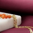 Image 2 of Gold necklace with blood coral