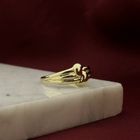 Image 7 of Gold ring with knotted design