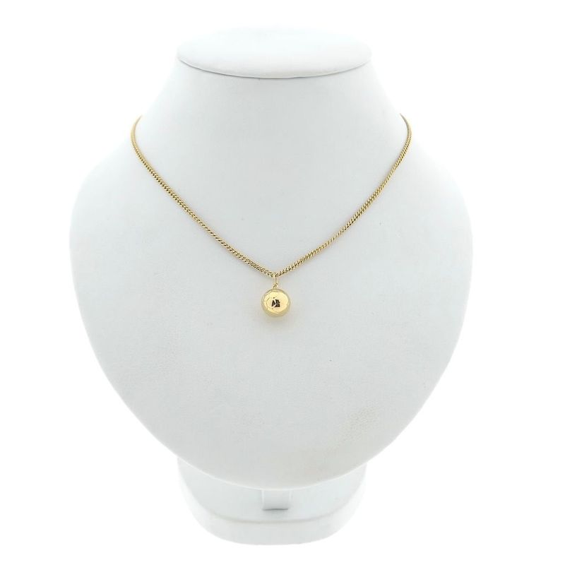 Image 6 of Gold pendant of a football