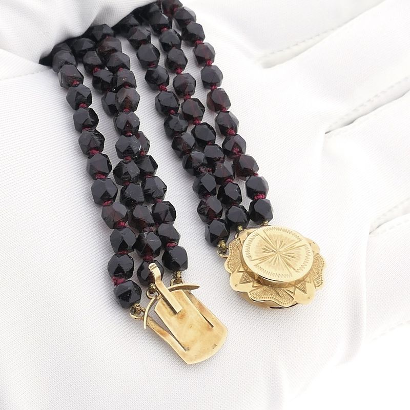 Image 10 of Antique garnet bead necklace with gold decorative clasp.