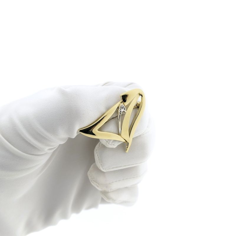 Image 10 of Two-tone gold fantasy brooch with diamond; 0.005 ct.