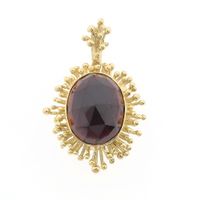 Vintage gold pendant with garnet
