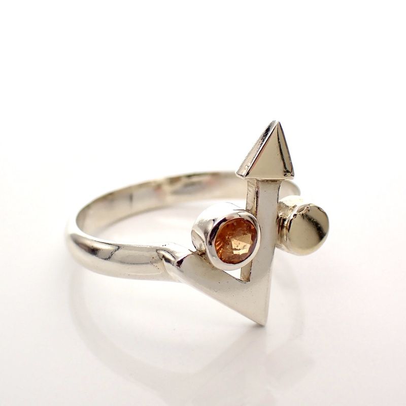 Image 1 of Silver ring with orange zirconia and gold-plated arrow