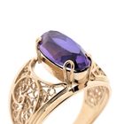 Image 3 of Vintage rose gold ring set with a synthetic purple gemstone.