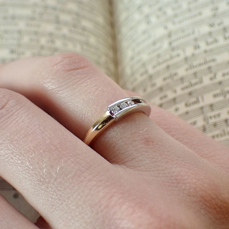 Image 2 of Two-tone gold subtle ring with diamonds; 0.10 ct.