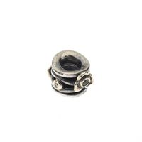 Pandora charm; Silver with gold; Growing Flower