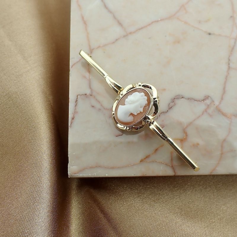 Image 2 of Vintage gold brooch with cameo
