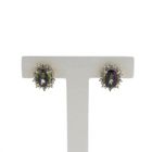 Image 1 of Gold stud earrings with mystical topaz
