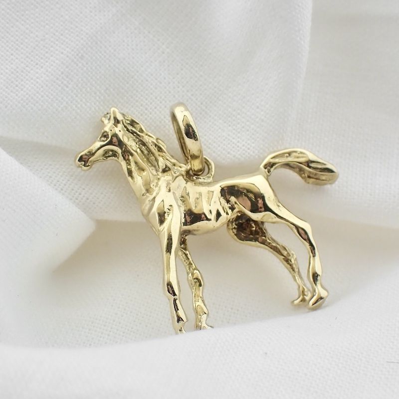 Image 4 of Gold pendant of a horse